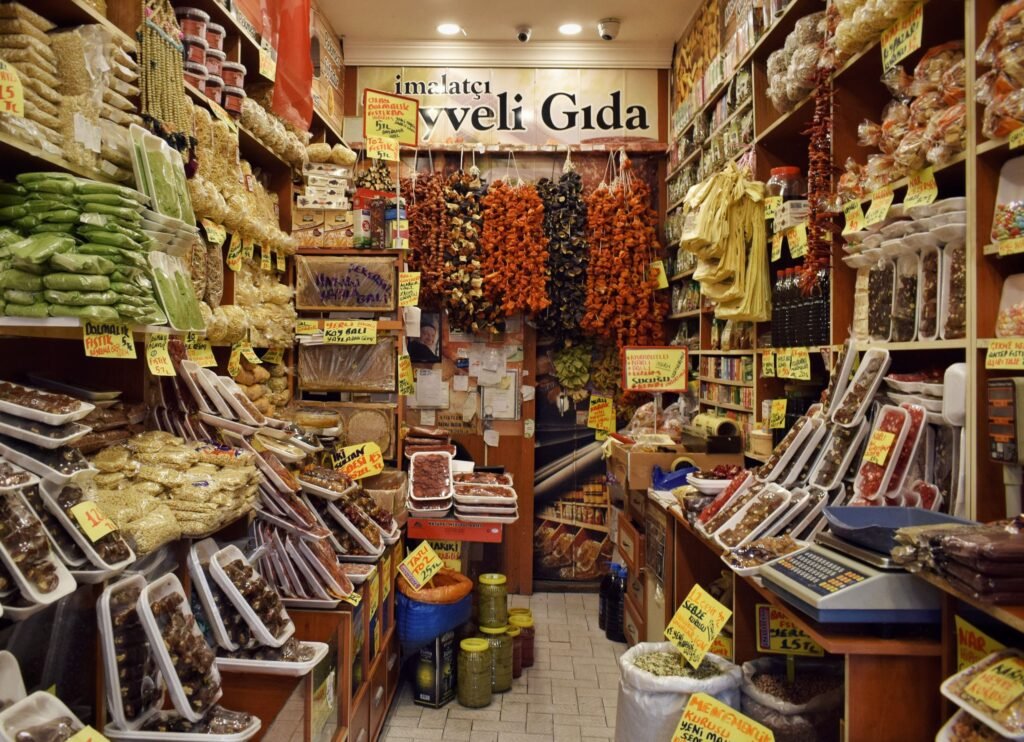 Vibrant interior of a Turkish spice shop showcasing a variety of dried goods and spices.